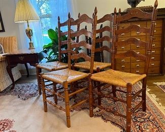 Set a four ladderback chairs