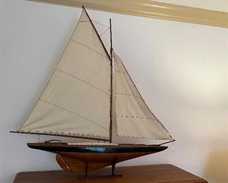 Handsome early pond boat with stand