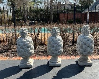 Concrete garden ornaments. Pineapples of course.
