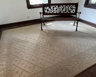 Room Size Rug and a Park Bench