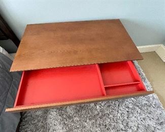 Small wood desk drawer lined in red cloth
