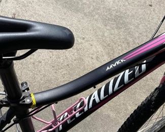 Myka girls bicycle with a helmet