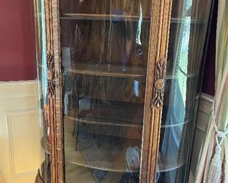 Bow front tiger oak curio