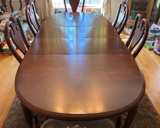 Dining table 2 leaves 10 chairs