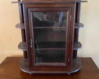 small glass cabinet