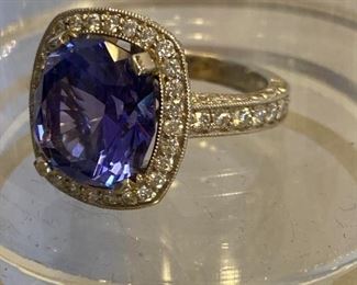 Surrounded by diamonds in  18K white gold 