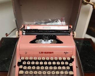 vintage pink Royal typewriter with case 