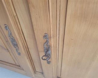 Antique buffet chest with Brass centerpiece 