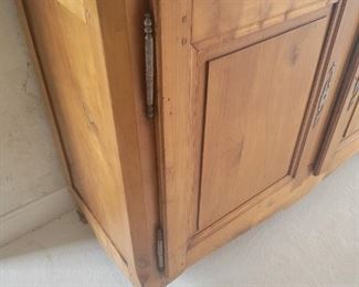 Antique buffet chest with Brass centerpiece 