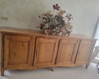 A very beautiful Antique buffet chest with Brass centerpiece 