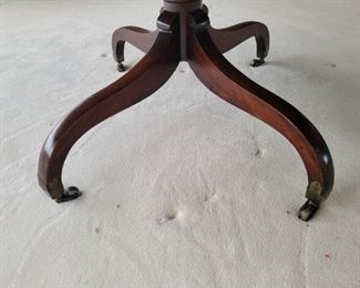 Antique Wood Table Comes with 2 leaves Has 4 swing legs on casters