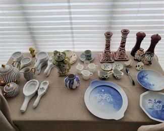 Porcelain and Glass Lot 2pc Royal Patton miniatures, 2pc hand painted miniature plates, 3pc tea set (purple stripe with gold), 8pc trivet set (porcelain-made in Japan), hand painted tea/chocolate pot, 3pc milk glass miniature creamer, crystal miniature vase/painted vase, tea and saucer (Made in Denmark), 3pc Joane Smith coffee cup with saucer and cake plate (Made in England), 3pc plate and serving dishes, 2 nine inch painted candlesticks (Made in Portugal), 2pc salt and pepper shaker set, Twiddle Dee & Twiddle Dum salt and pepper shakers, 2pc hand painted miniature creamer set, hand painted porcelain spoon