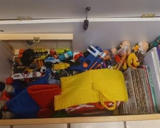 Wooden toy box with toys and books