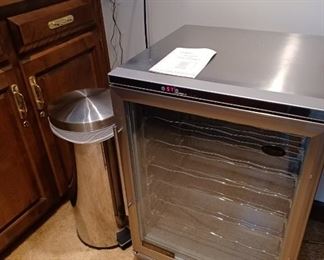 Wine Fridge and trash can