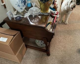 . . . a cute end table with built in magazine rack -- notice crystal candy dish on top