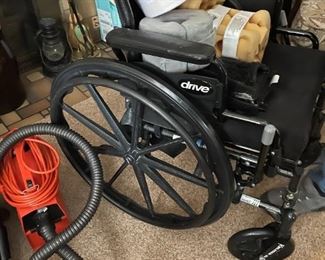 . . . an almost-new wheel chair and portable vac 