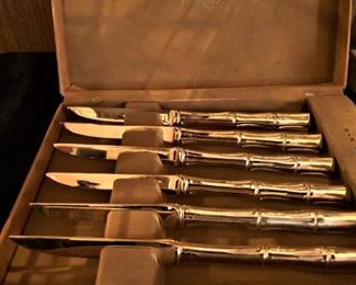 Set of fruit knives in gold tone