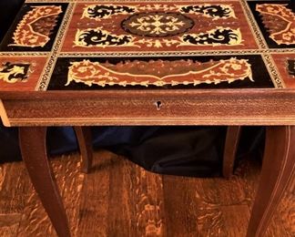 Small table with inlaid wood