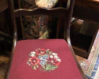 One of several parlor chairs (different needlepoint seats)