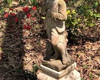 One of several statues in the yard
