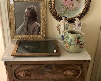 Marble top chest; framed hand-painted plate