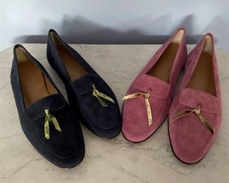 Many pairs of shoes including Ferragamo, Gucci, Chanel, Tory Burch, etc.