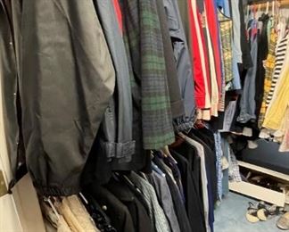 Many rooms and racks of women's, girls and kids clothing.