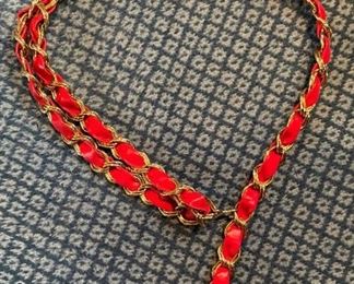 St. John's chain and leather belt