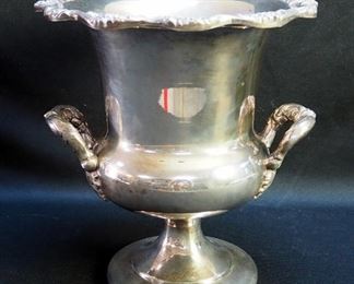 Silver Plate Serving Dishes Including Champagne Bucket, Footed Serving Platter, Scalloped Dish, And Oval Server