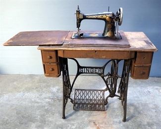 Antique Singer Sewing Machine With Cast Iron Treadle Base And 4 Drawer Cabinet, 30" x 36" x 17.5