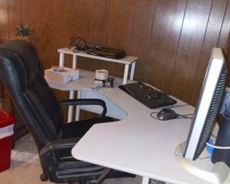 Office chair, desk and desktop computer