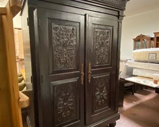 Indonesian carved wood armoire