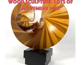 Lot 19 Modernist Abstract Wood Sculpture. Lots of movement and