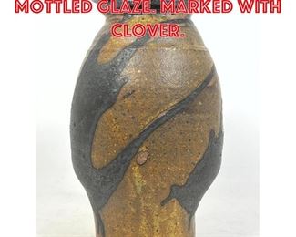 Lot 68 Heavy pottery vase mottled glaze. Marked with clover. 