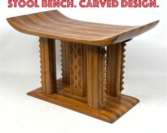 Lot 132 Custom African Style Stool Bench. Carved design. 