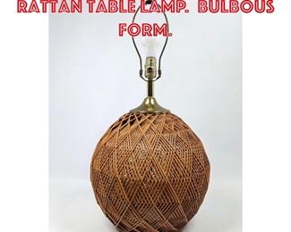 Lot 191 Intricate Woven Rattan Table Lamp. Bulbous form. 