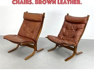Lot 429 Pair WESTNOFA Lounge Chairs. Brown leather. 