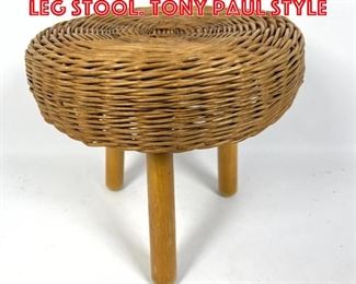 Lot 466 Woven wicker three leg stool. Tony Paul Style