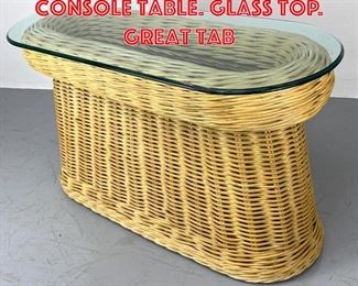 Lot 495 Woven Pencil Rattan Console Table. Glass Top. Great tab
