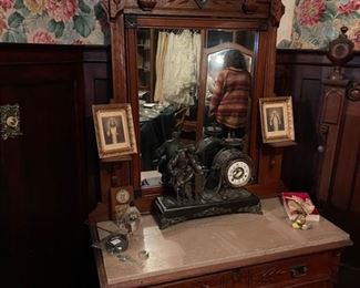antique marble top dresser and Ansonia figural clock
