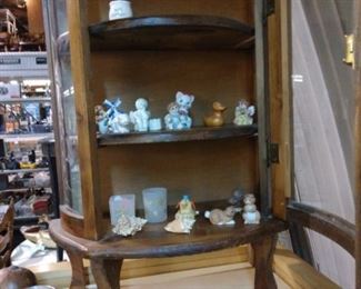 Vintage rounded glass curio cabinet