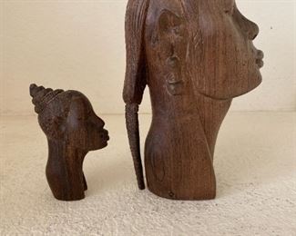 Hand carved wooden woman busts 