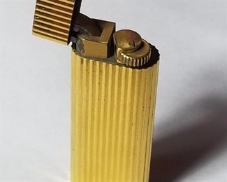 Cartier gold plated Lighter with N.E.M monogramed on the top