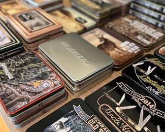 Very large selection of commemorative knife sets.