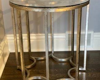 Metal and glass side table. Measures 24" D x 25" H. Photo 1 of 2.