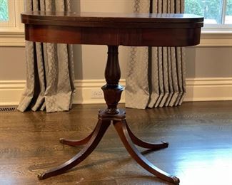 Vintage flip-top demi lune game table. Table measures 32" x 32" x 29" H when open. When closed, it measures 32" W x 16" D x 29" H. Photo 1 of 4.