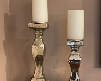 Pair of "silver" pedestal candlesticks.