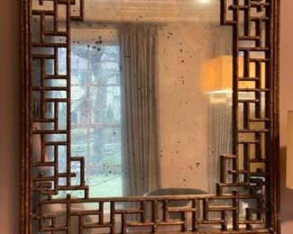 Vintage faux bamboo lattice mirror with smokey glass. Measures 39" x 46". Photo 1 of 2.