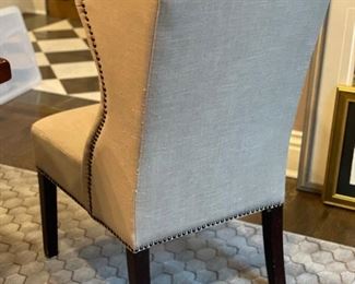 Arhaus upholstered captain chair with tufted back - 2 available. Each measures 24" W x 24" D; 18.5" seat height. Photo 2 of 2.