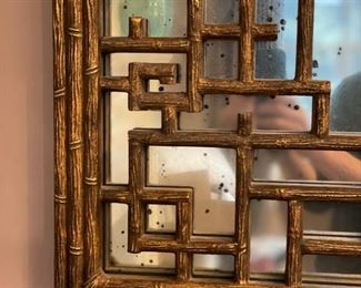 Vintage faux bamboo lattice mirror with smokey glass. Measures 39" x 46". Photo 2 of 2.